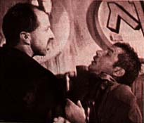 Leon beats up Deckard some more