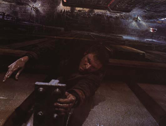 Deckard hanging on for his life